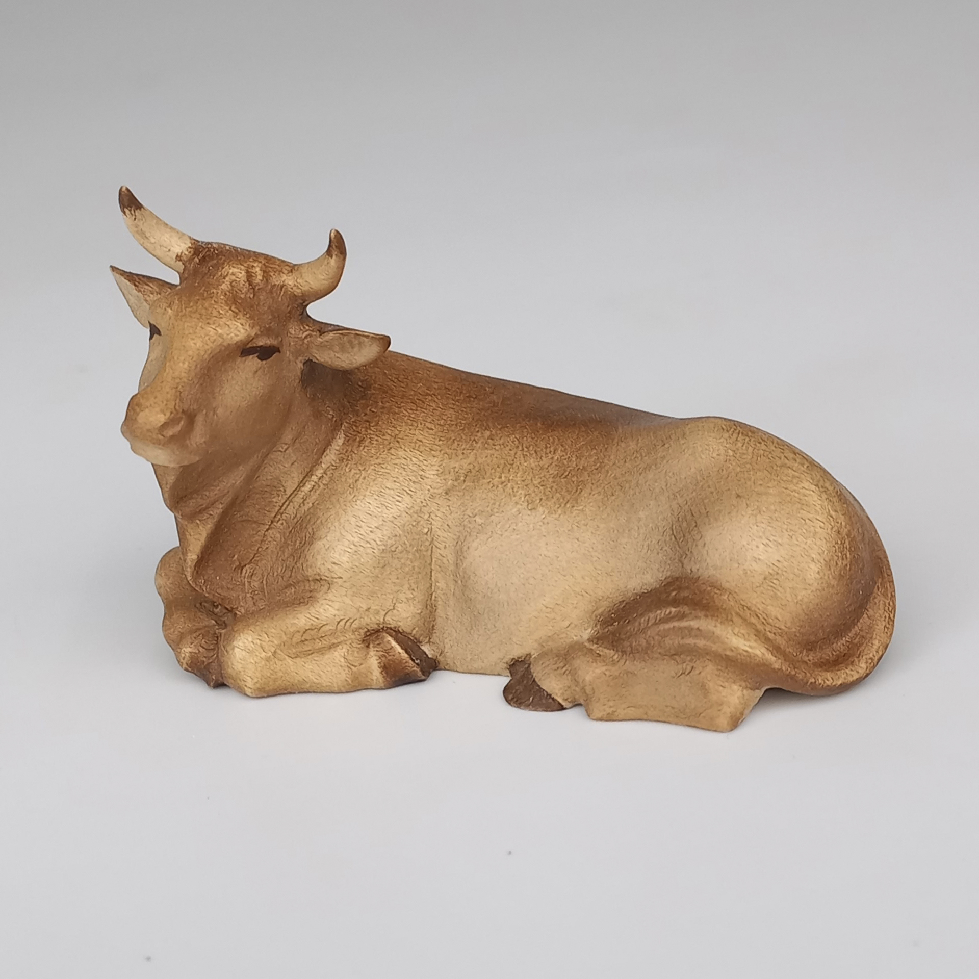 Ochse aus Holz, mehrfach gebeizt