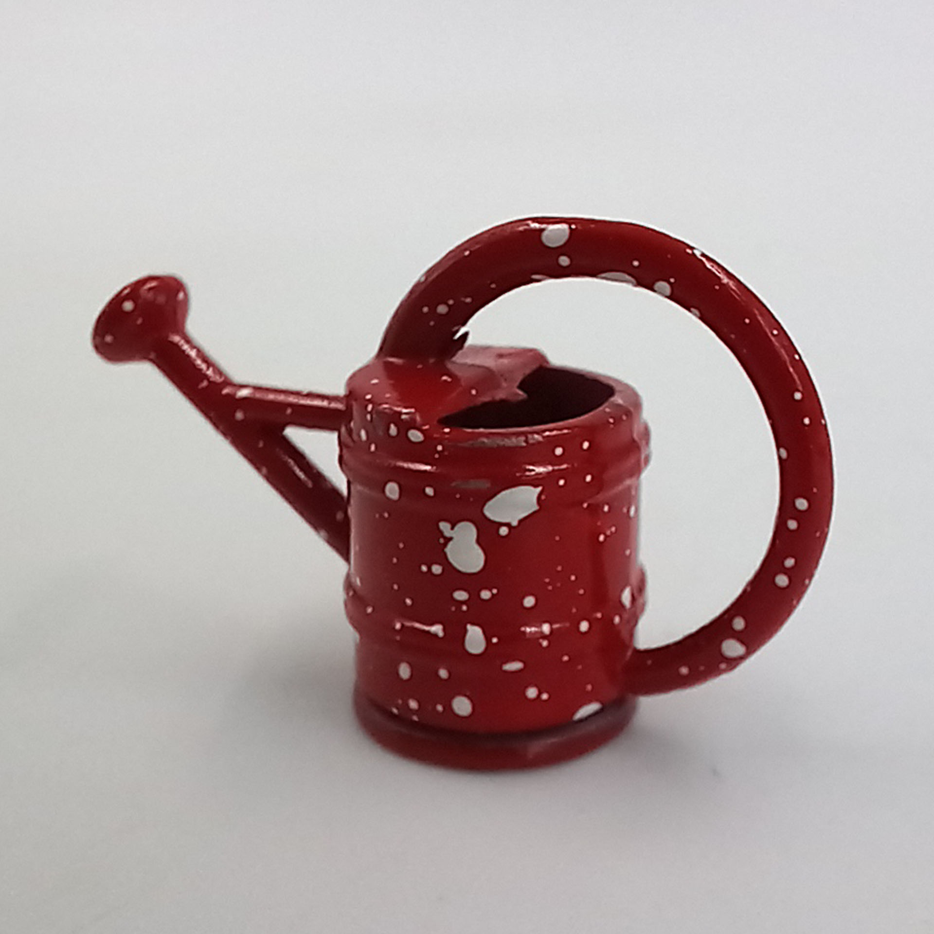 Giesskanne rot mit weissen Sprenkeln