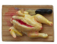 Suppenhuhn auf Brett