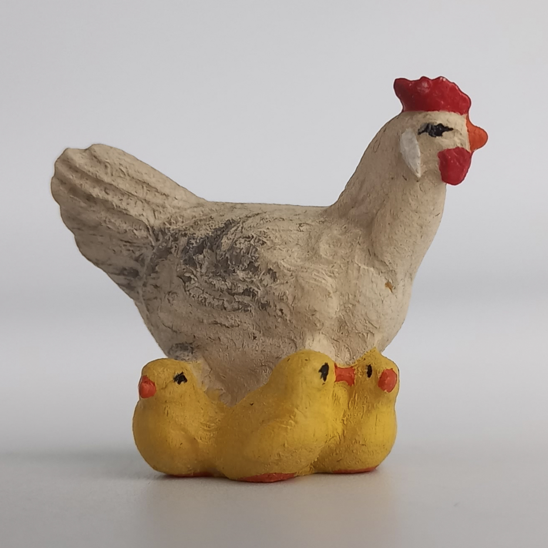 Holzfigur Henne mit Küken