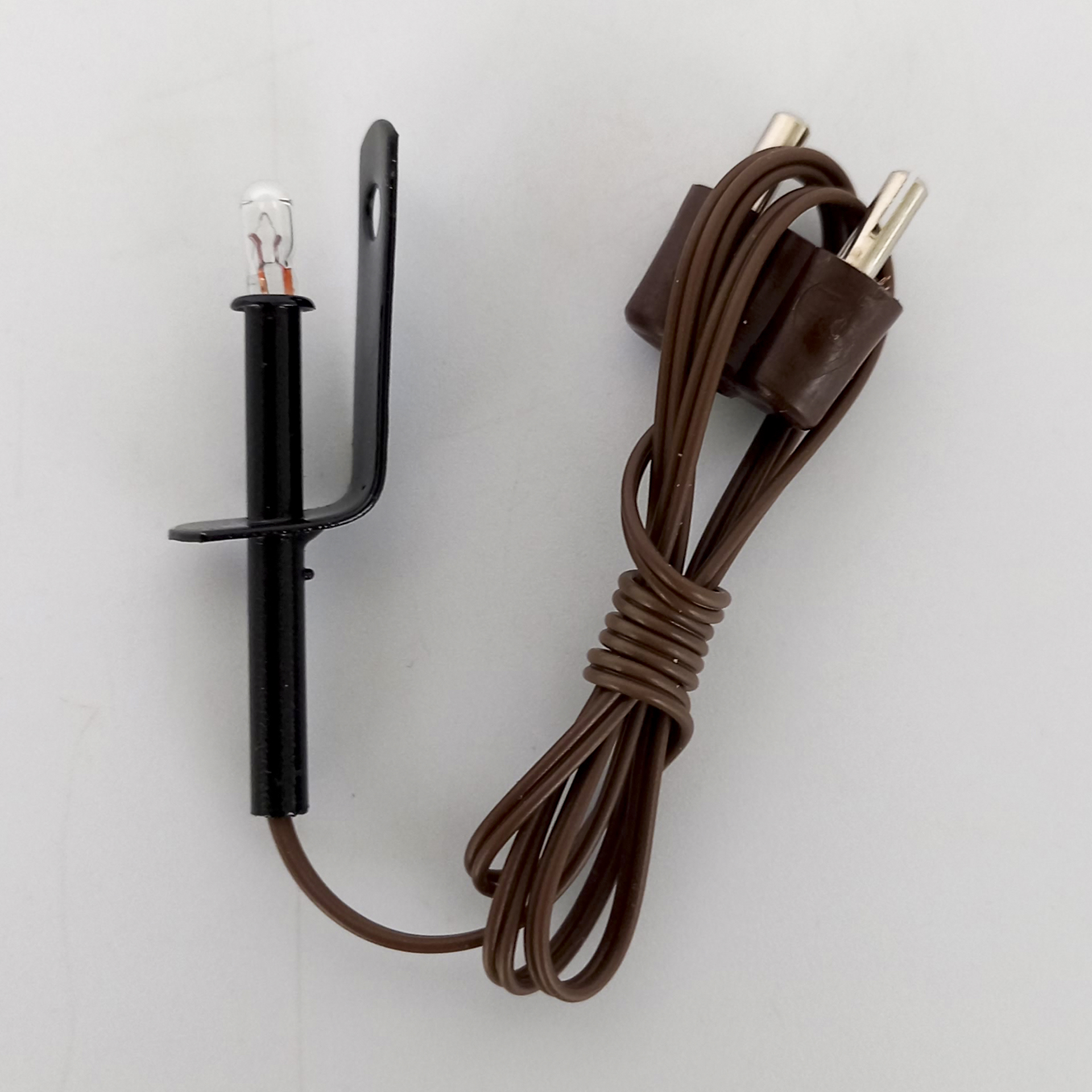 kleine Fackel in schwarz mit Halterung und braunem Kabel